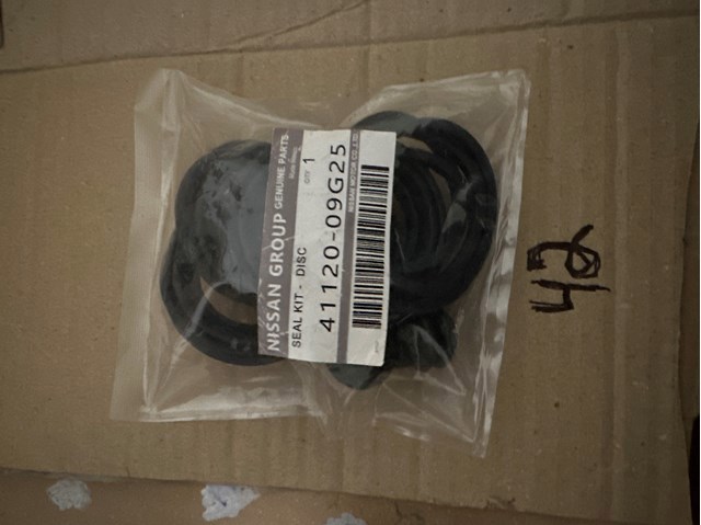 Ремкомплект суппорта гальмівного, переднього 4112009G25 NISSAN