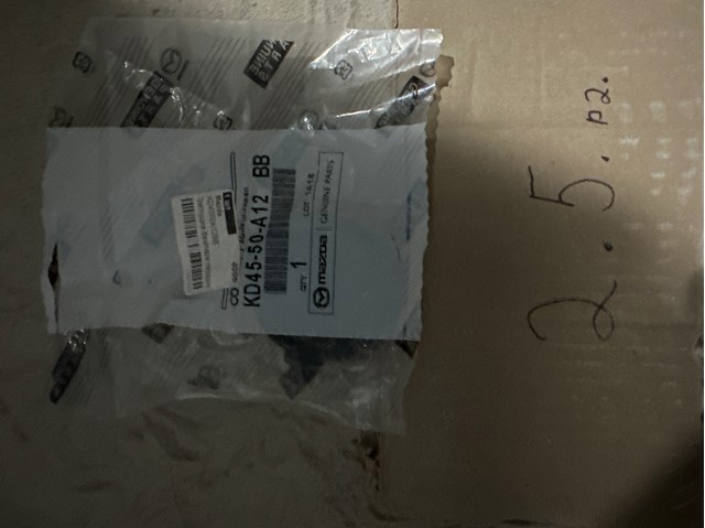 Заглушка бампера буксирувального гака, передня KD4550A12BB MAZDA