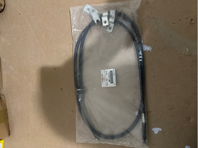 Трос стоянкового гальма задній лівий MN102416 MITSUBISHI