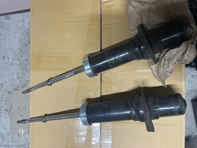 Стойка амортизатора передняя 4431009003 SSANG YONG