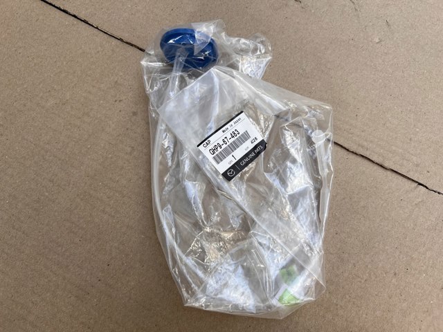 Кришка бака омивача GHP967483 MAZDA