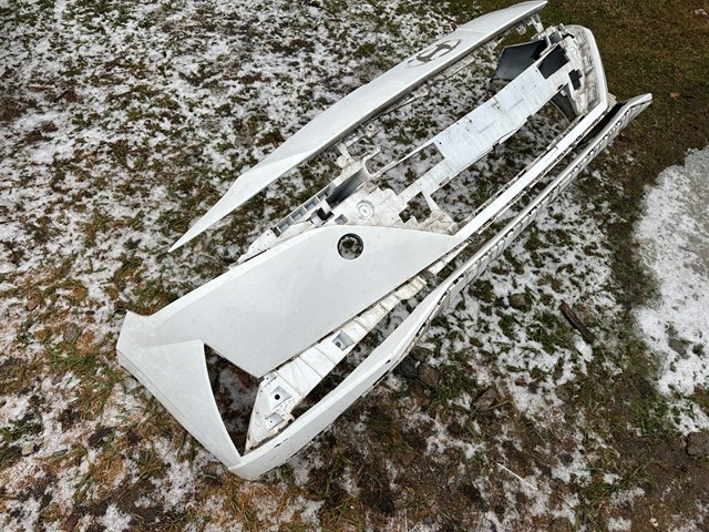 Накладка бампера переднього 86511AA010 HYUNDAI