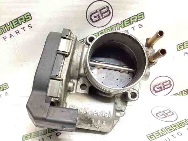 Дросільна заслінка в зборі 06G133062J VAG