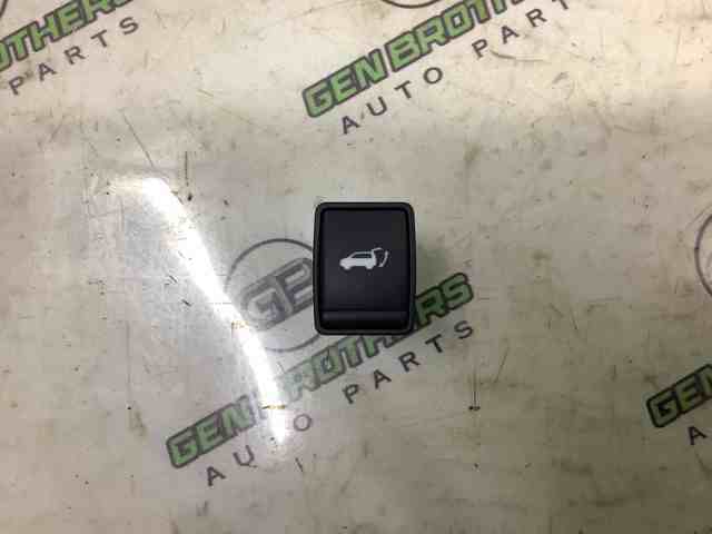 Кнопка салону приводу замка 3/5 двері (ляди) / кришки багажнику 252614CL0A NISSAN