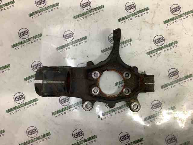 Кулак поворотний передній правий 400144CE0A NISSAN