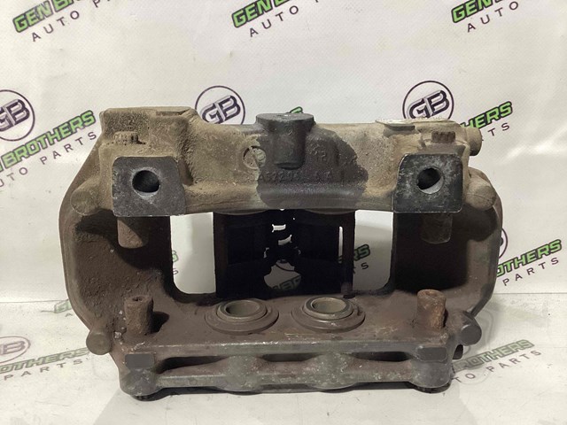Супорт гальмівний задній правий 7P0615424 VAG
