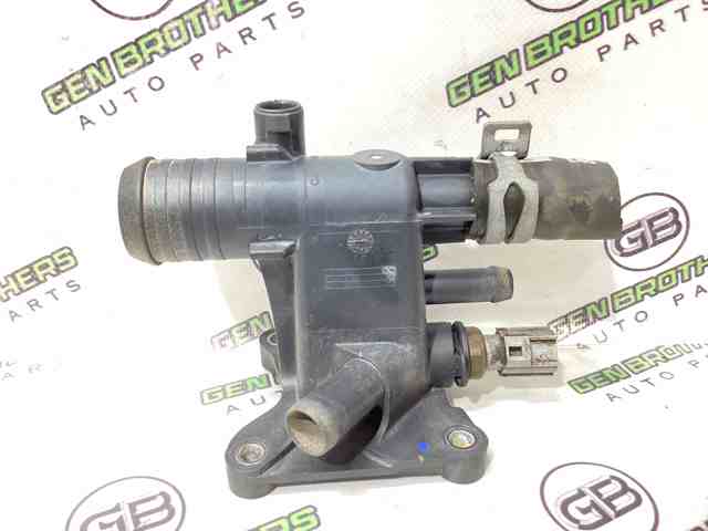 Фланець системи охолодження (трійник) CJ5E8K556AB FORD