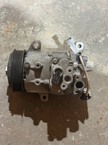 Компресор системи кондиціювання 73111AN00A SUBARU