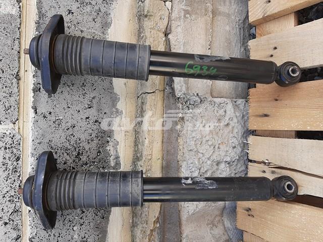 Купити 562103JA0B Nissan/Infiniti Стійка амортизатора задня