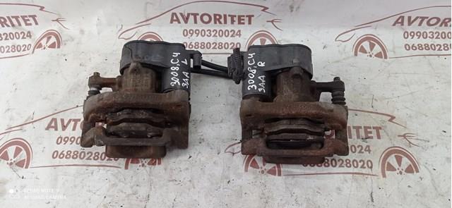 Супорт задній лівий AD777014 Peugeot/Citroen
