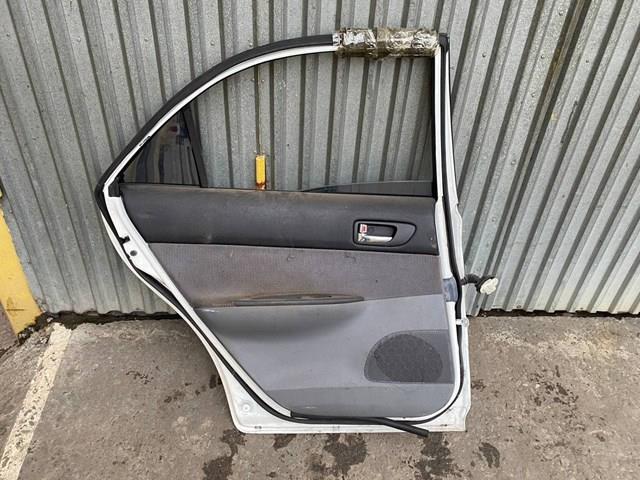 Двері задні, ліві Mazda GK2C73020