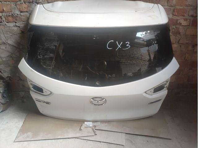DKY06202XB Mazda Треті двері
