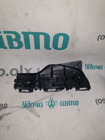 30807532 AND Кронштейн бампера переднього, правий