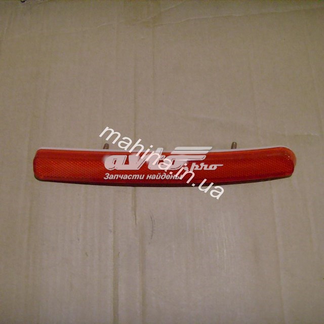 Катафот (відбивач) заднього бампера, лівий 1017001562 Geely
