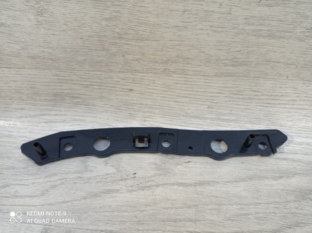 Купити GN1517A870AA Ford Кронштейн бампера переднього, лівий