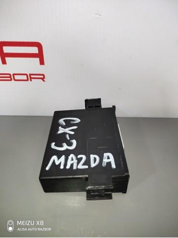 Блок керування центральним замком на Mazda 2 (DL, DJ)