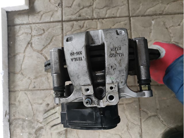 Купити TQ33087 Tqparts Супорт задній правий