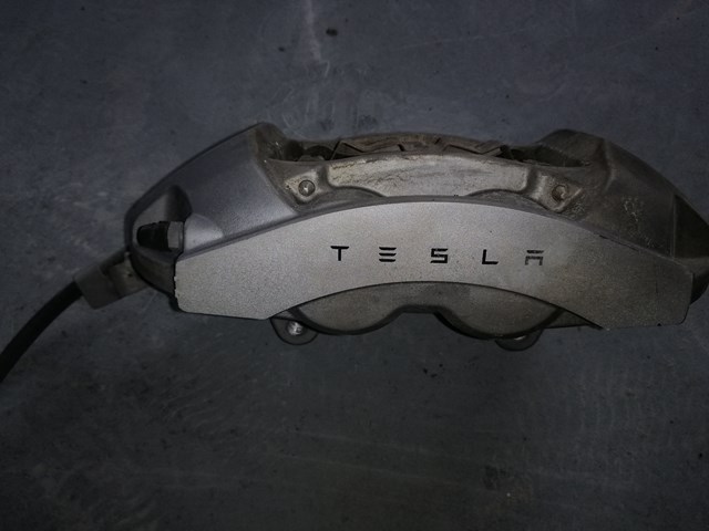 Купити 104462200E Tesla Motors Супорт гальмівний передній правий