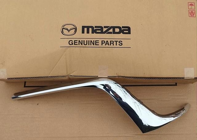 Молдинг решітки радіатора, правий Mazda KAAA507J0A ціна, від 138.41 USD