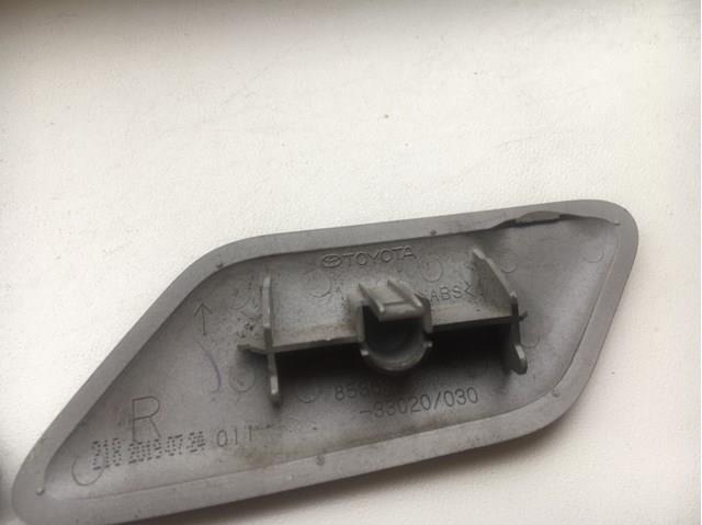 Накладка форсунки омивача фари передньої TQ25334 Tqparts