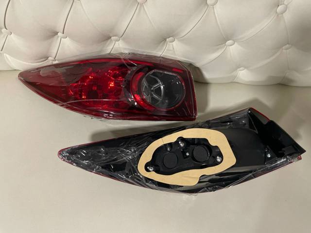 Задня ліва зовнішня фара Mazda BHN151160B ціна, від 133.14 USD