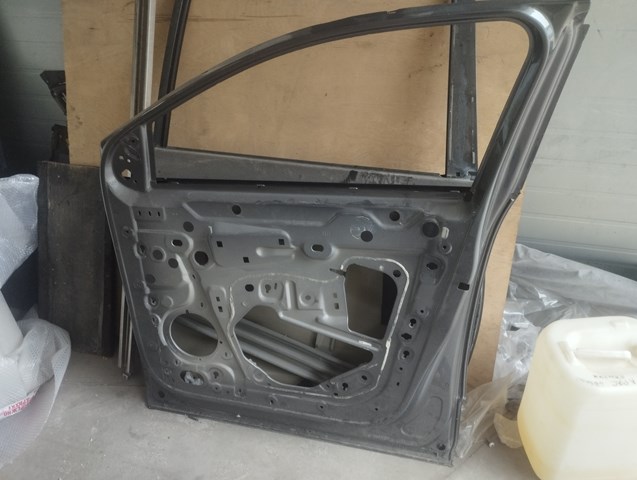 Дверка передня права Peugeot/Citroen 9812306280