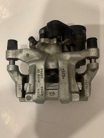 BCYA2661X Mazda Супорт гальмівний задній правий