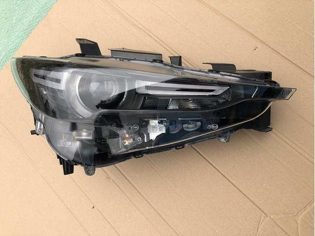 Фара права KB8N51031H Mazda