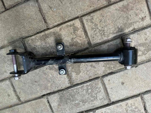 Важіль задньої підвіски поперечний, лівий Mazda KB7W28550