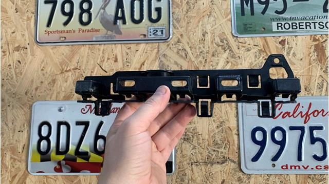 Кронштейн зовнішньої накладки порога правого 7387342 BMW