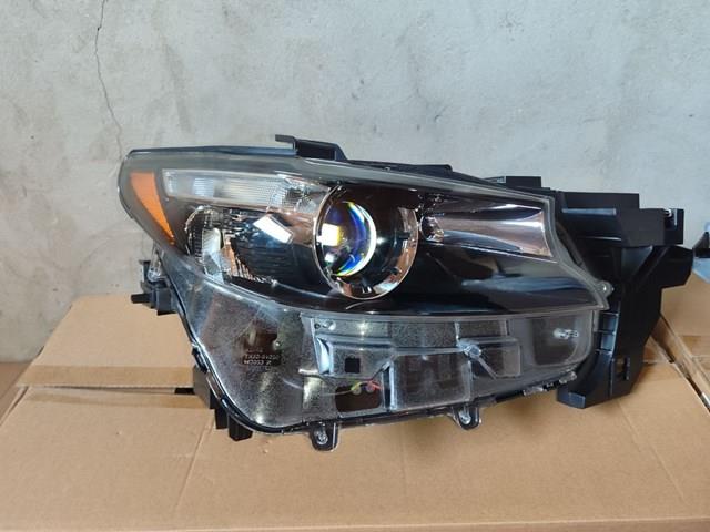 Фара права TM52510K0D Mazda