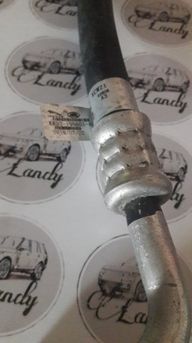 LR115895 Land Rover Шланг кондиціонера, від компресора до радіатора