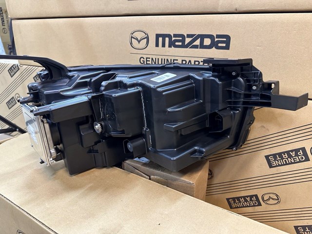 Купити VA4051040B Mazda Фара ліва передня