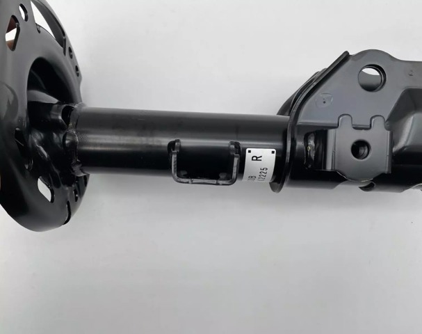 Купити TK5034700B Mazda Амортизатор передній, правий