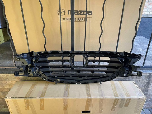 Решітка радіатора TK4950710J Mazda