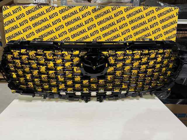Купити VA5150710B Mazda Захисна решітка радіатора