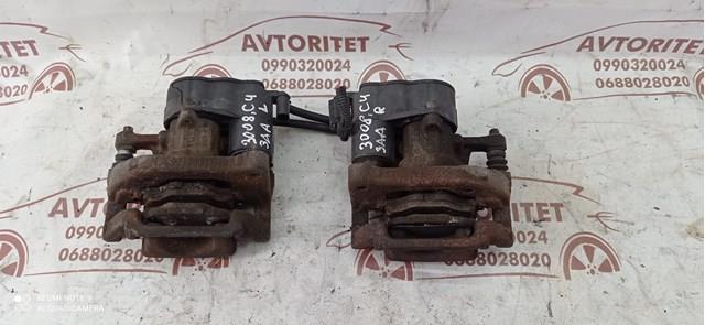 Супорт задній правий AD777015 Peugeot/Citroen