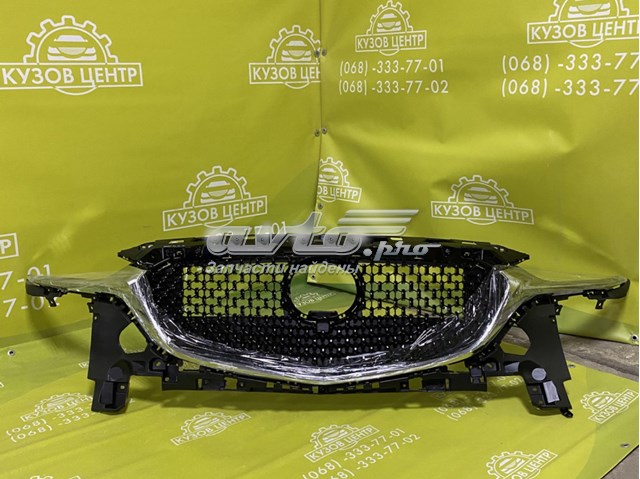 Решітка Mazda GSH750719