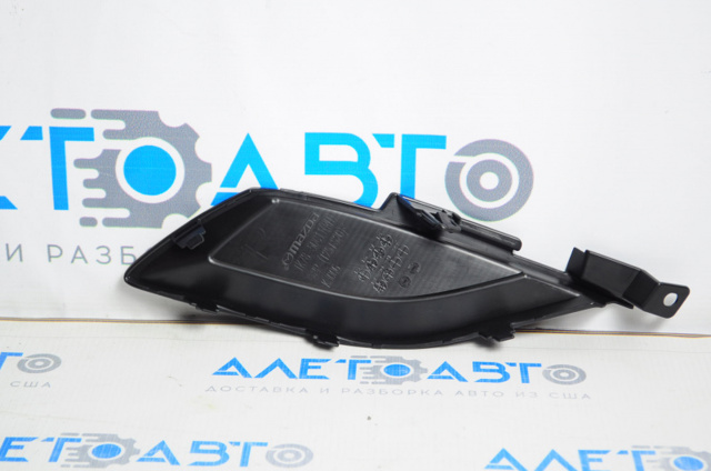 Решітка переднього бампера, права Mazda TK7850C11B ціна, від 9.98 USD