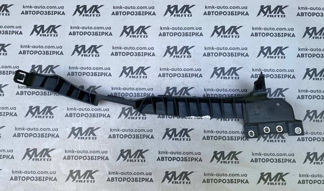 Кронштейн кріплення бампера переднього лівий General Motors 23158323