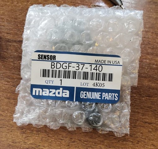 Датчик тиску в шинах BDGF37140 Mazda