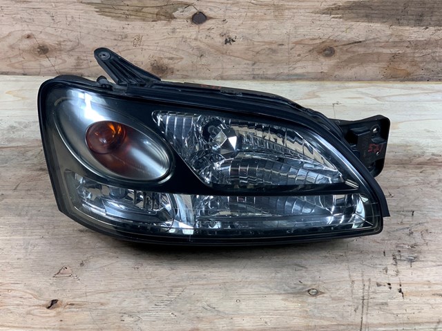 Фара передня права Subaru 84001AE400