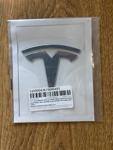 Фірмовий значок капота Tesla 149494900A ціна, від 11.40 USD