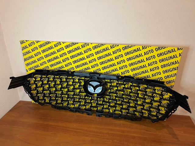 Купити VA5050710B Mazda Захисна решітка радіатора