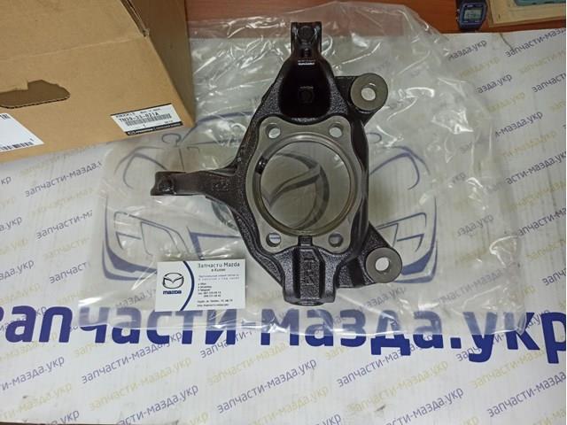 Купити TN3933021A Mazda Цапфа передні праві