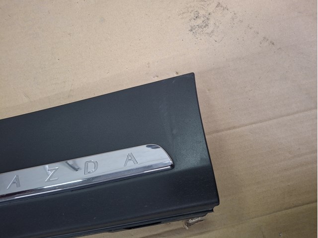 Молдинг задніх лівих дверей KMV651RD0B Mazda