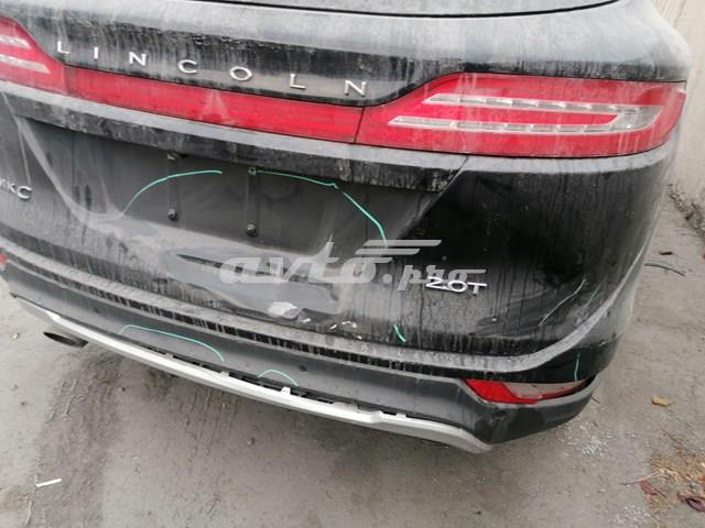 Задній бампер EJ7Z17810ACPTM Ford