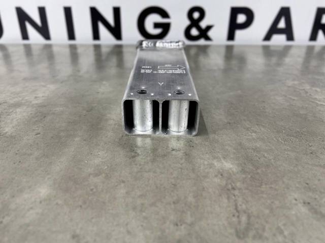Кронштейн підсилювача переднього бампера Rhino TL3010030AL