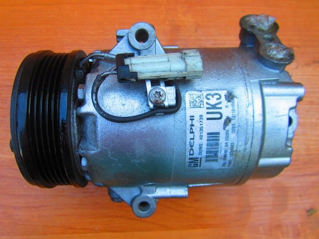 Компресор системи кондиціювання General Motors 13286083 ціна, від 159.17 USD