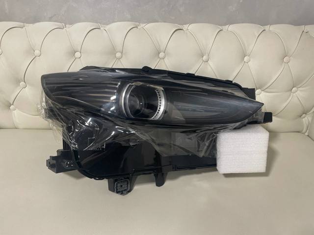 Купити DGJ151030 Mazda Права блок фара